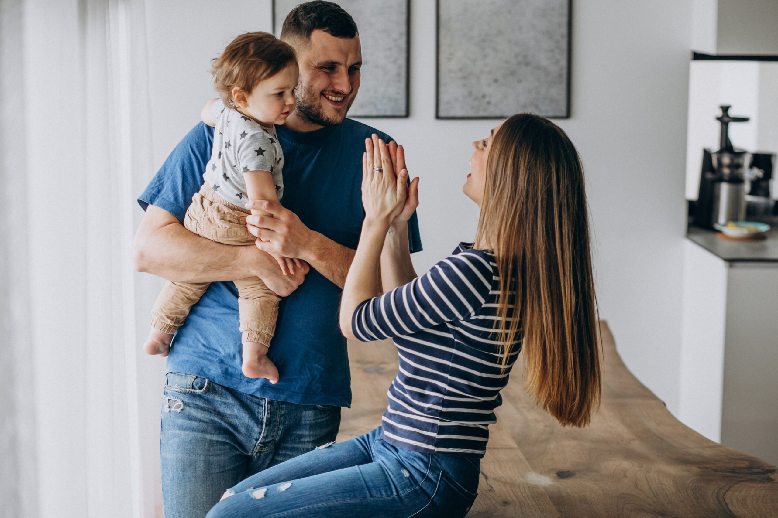 A young family at home, planning for their future together